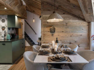 Experience rustic charm and modern comfort in this stunning mountain retreat.