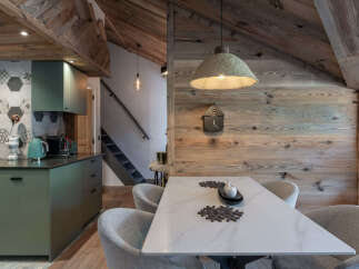 Experience cozy living in this charming chalet-style dining area and kitchen.