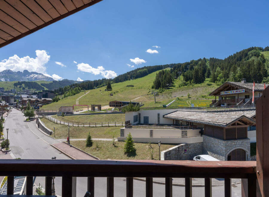 Experience the charm of mountain living with this stunning property offering breathtaking views of the Alps.