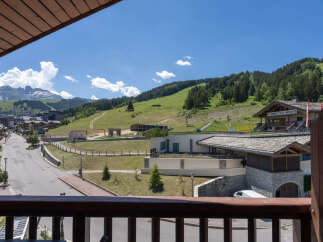 Experience the charm of mountain living with this stunning property offering breathtaking views of the Alps.