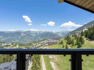 Experience breathtaking mountain views from this stunning property, offering a panoramic vista of the surrounding Alps.