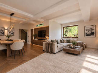Experience luxurious mountain living in this stunning open-concept living and dining area.