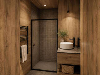 Experience modern luxury in this stunning bathroom, featuring a sleek walk-in shower with tiled walls and a black frame.