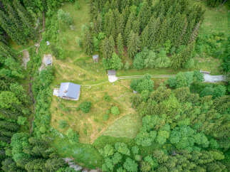 Discover this secluded mountain retreat nestled amidst lush green forests.