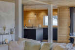 Experience modern mountain living in this stunning open-plan kitchen and living area.