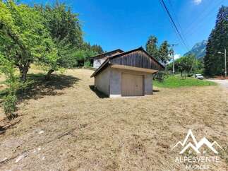 Discover this charming property nestled in a serene mountain landscape, perfect for those seeking tranquility and nature.