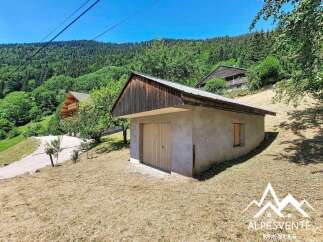 Discover this charming property nestled in a serene mountain setting, perfect for those seeking tranquility and nature.
