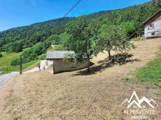 Discover this charming property nestled in a serene mountain landscape, perfect for those seeking tranquility and natural beauty.