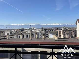 Discover this stunning property with breathtaking views of snow-capped mountains, offering a serene backdrop to urban living.