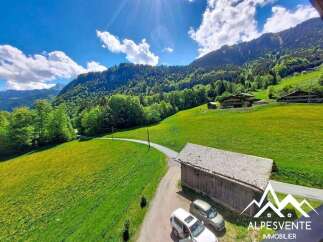 Discover this stunning property nestled in a picturesque mountain landscape, offering breathtaking views of lush green meadows and dense forests.