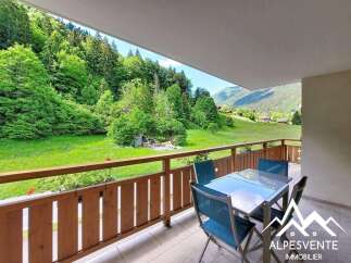 Enjoy breathtaking mountain views from this charming balcony, perfect for al fresco dining or morning coffee.