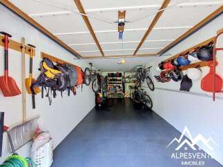 Discover this spacious garage, perfect for storing all your outdoor gear and vehicles.
