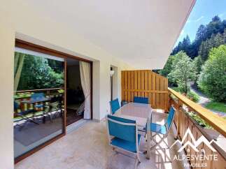 Enjoy breathtaking mountain views from this charming balcony, perfect for al fresco dining or morning coffee.