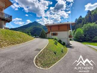 Discover this charming property nestled in a picturesque mountain setting, perfect for those seeking tranquility and natural beauty.