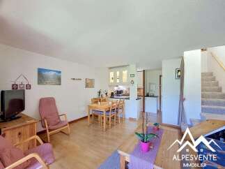 Discover this charming living and dining area, perfect for family gatherings and entertaining guests.