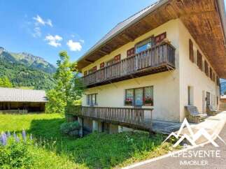 Discover this charming property nestled in a serene mountain landscape, perfect for those seeking tranquility and natural beauty.