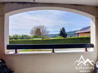 Enjoy the serene mountain views from this property's balcony, offering a peaceful retreat.