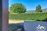 Discover this charming property with a beautifully manicured hedge providing privacy and a serene backdrop.