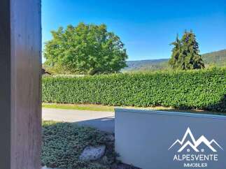 Discover this charming property with a beautifully manicured hedge providing privacy and a serene backdrop.
