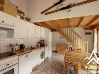 Discover this charming kitchen and dining area, perfect for cozy mountain living.