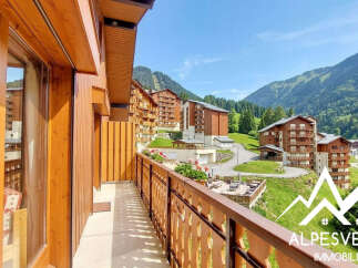 Enjoy breathtaking mountain views from this charming balcony, perfect for savoring your morning coffee or evening drinks.