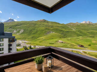Experience breathtaking mountain views from this stunning balcony, perfect for enjoying your morning coffee or evening relaxation.
