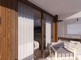 Experience luxurious mountain living with this stunning balcony featuring a comfortable armchair and a side table, perfect for enjoying the breathtaking views.