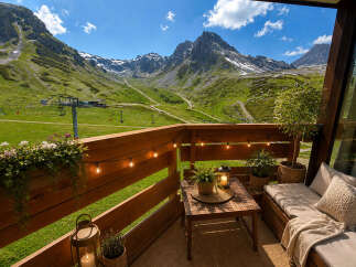 Experience breathtaking mountain views from this charming balcony, perfect for enjoying your morning coffee or evening relaxation.