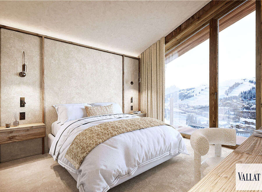 Experience luxury mountain living in this stunning bedroom featuring a plush king-sized bed and a cozy throw.