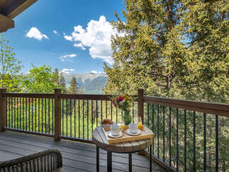 Enjoy your morning coffee with a breathtaking mountain view from this stunning balcony.
