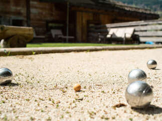 Enjoy leisurely afternoons with a game of bocce ball on your private court, perfect for entertaining guests or unwinding after a long day.