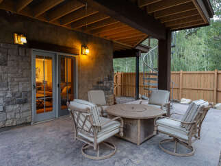 Enjoy outdoor living on this spacious patio, perfect for entertaining or relaxing.