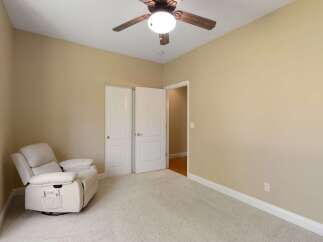 This cozy room features a comfortable recliner, perfect for relaxation.