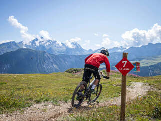 Experience the thrill of mountain biking on scenic trails with breathtaking panoramic views.