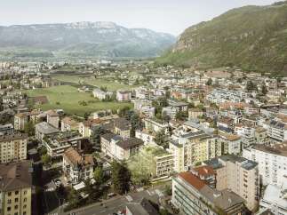 Discover modern living in this vibrant urban landscape, nestled against a backdrop of majestic mountains.
