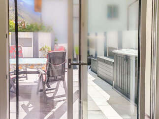 Step outside to a charming patio area, perfect for enjoying the fresh air and mountain views.