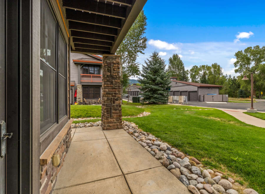 Experience comfortable living with this charming property featuring a welcoming covered porch and a beautifully landscaped yard.