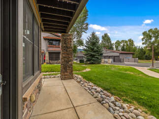 Experience comfortable living with this charming property featuring a welcoming covered porch and a beautifully landscaped yard.