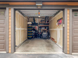 Explore this spacious two-car garage, perfect for storing vehicles and recreational gear.