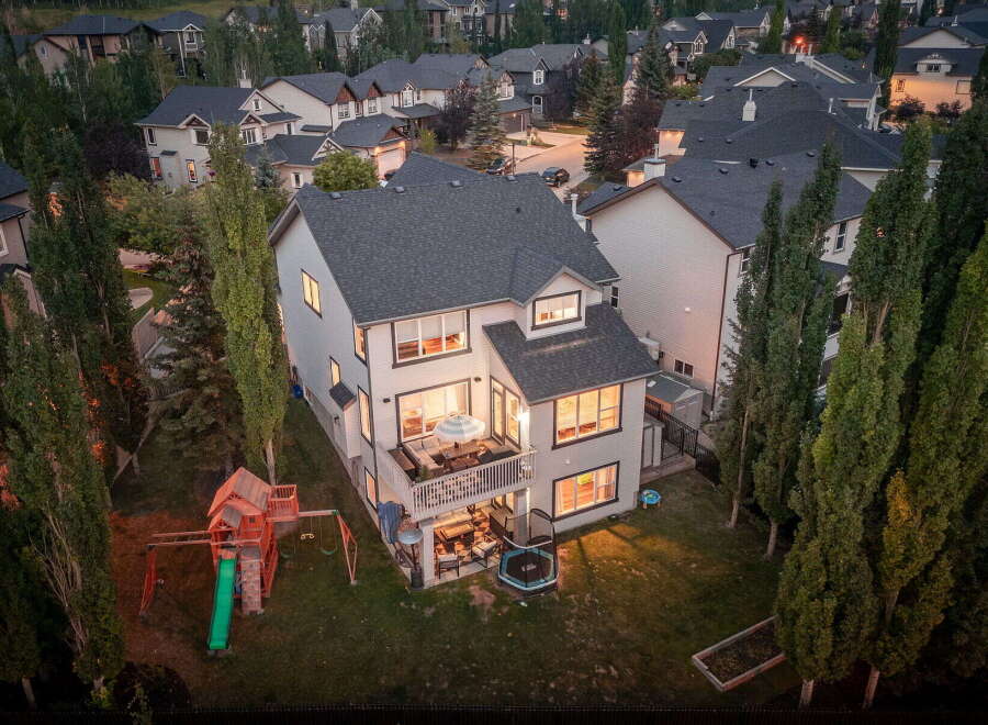 Discover this stunning family home featuring a spacious backyard with a playground, trampoline, and a multi-level deck perfect for entertaining.