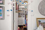 Discover a charming and organized closet space, perfect for keeping your belongings tidy.