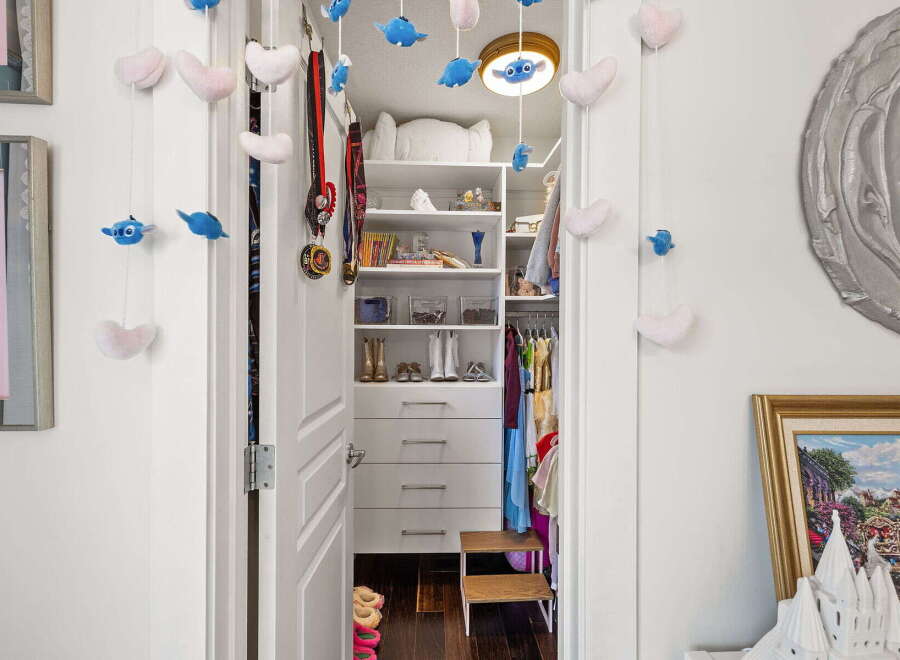 Discover a charming and organized closet space, perfect for keeping your belongings tidy.