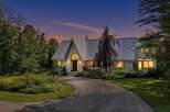 Experience the charm of this stunning home, featuring a unique metal roof and an arched entryway that exudes architectural elegance.