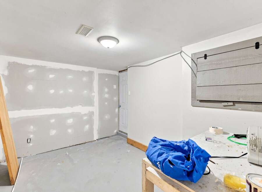 This unfinished basement space is ready for your personal touch.