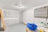 This unfinished basement space is ready for your personal touch.