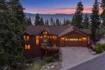 Experience luxury living in this stunning mountain home with breathtaking lake views.