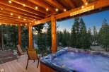 Experience ultimate relaxation in this stunning mountain retreat, featuring a luxurious hot tub perfect for unwinding under the stars.