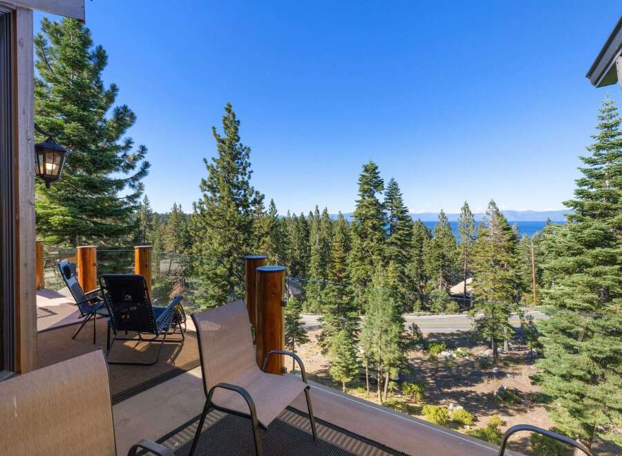 Enjoy breathtaking lake and mountain views from this stunning balcony, perfect for relaxing or entertaining.