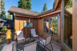 Enjoy the serene mountain views from this charming outdoor seating area, perfect for morning coffee or evening relaxation.