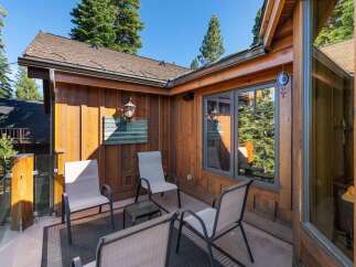Enjoy the serene mountain views from this charming outdoor seating area, perfect for morning coffee or evening relaxation.